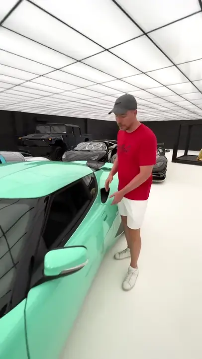 A vertical clip exported from GPT-Video, titled “$100,000,000 car doors”, with word-by-word captions